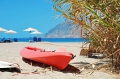 Red kayak in Plakias beach on Crete